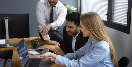 IT Staff Augmentation team working in front of a computer