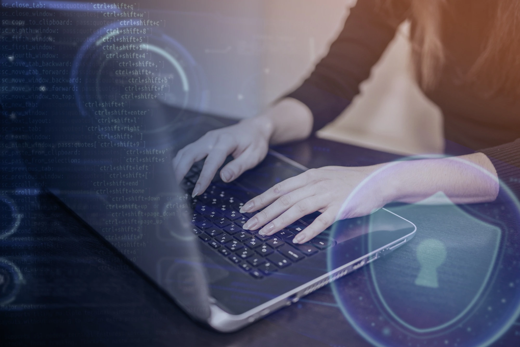 Woman in front of a computer and a drawing of a padlock in blue referring to security