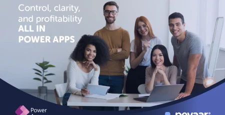 Partners working in front of a laptop enjoying the Power Apps project profitability app