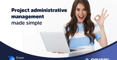 Happy young woman in front of a laptop using project management.