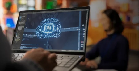 Businessman with his laptop to train an AI agent