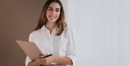 Woman holding the project indicators results in her hands
