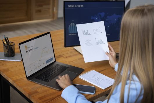 business-person-looking-finance-graphs